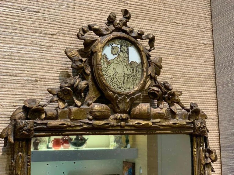 19th Century French Carved Giltwood Mirror with Verre Églomisé Decoration