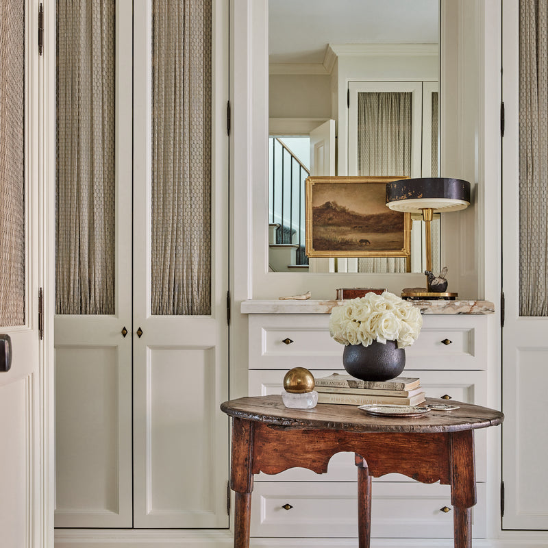 A walk-in closet designed by Nate Berkus and Jeremiah Brent for their West Village home.