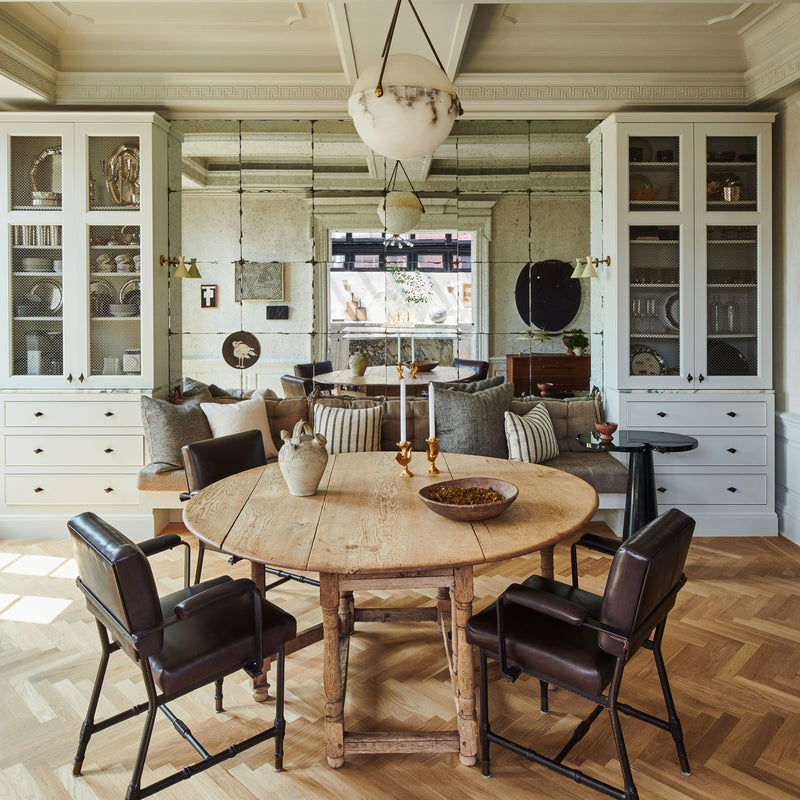 This warm and textural dining area was designed by Nate Berkus and Jeremiah Brent for their family home in Manhattan.