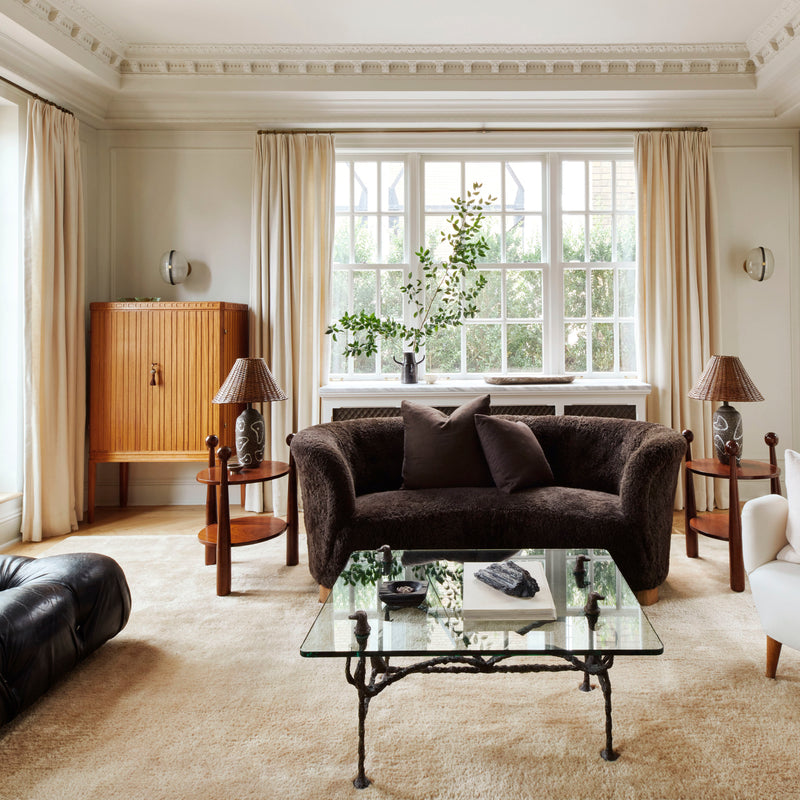A lived-in and light-drenched living area by Nate Berkus and Jeremiah Brent.