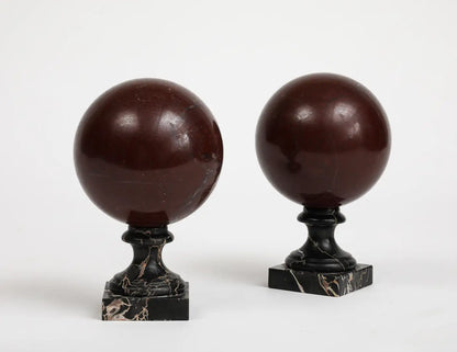Pair of 19th Century Red Marble Spheres on Black Marble Stands