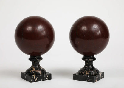 Pair of 19th Century Red Marble Spheres on Black Marble Stands