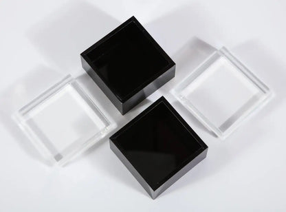 Pair of Black and Clear Lucite Decorative Boxes